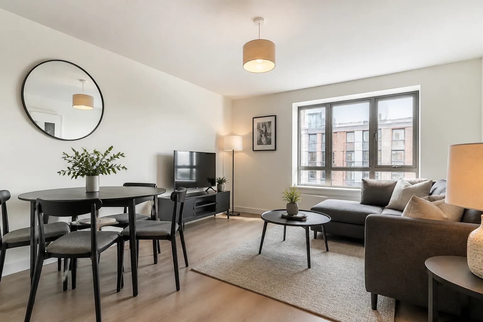 Bright rental apartment living room prepared for lettings marketing, clean contemporary space with strong natural light