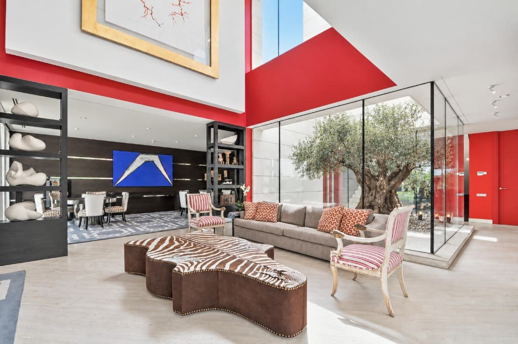 The same reception room virtually staged with contemporary furniture
