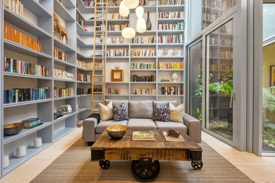 HDR interior photograph of a library snug with balanced window light