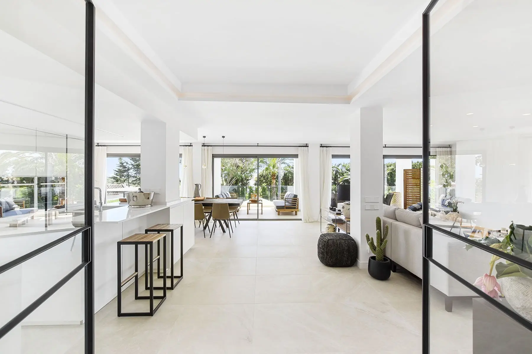 Clean, clutter-free open-plan living space with bright natural light