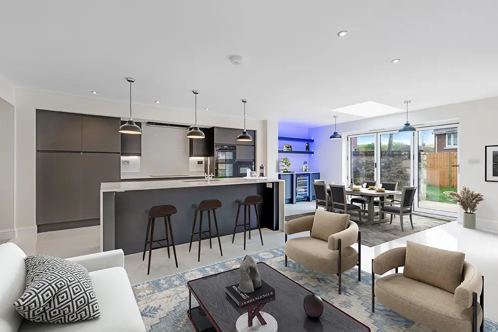 Virtually staged open-plan kitchen and living room with modern furniture
